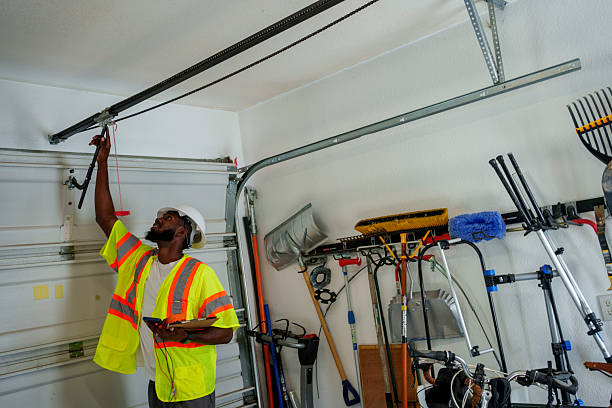 Professional Garage Door Panel Replacement technician working in Phenix City, AL